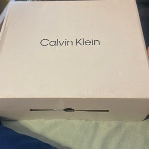 Calvin Klein booties, never worn. Including box and shoe stuffing.